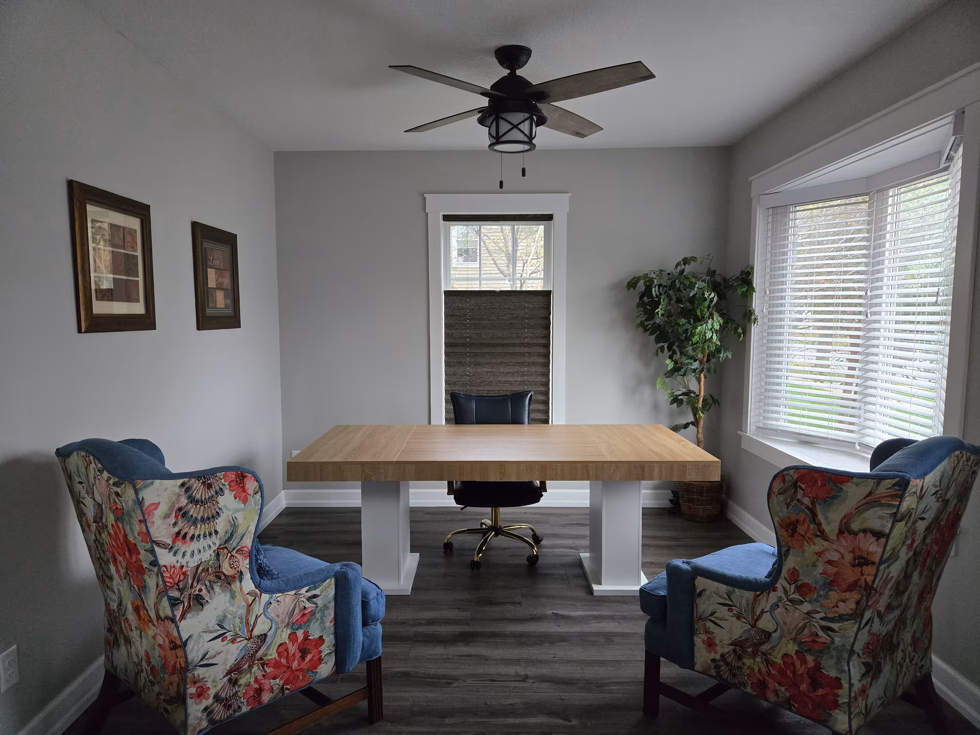 Dedicated workspace with desk and chairs